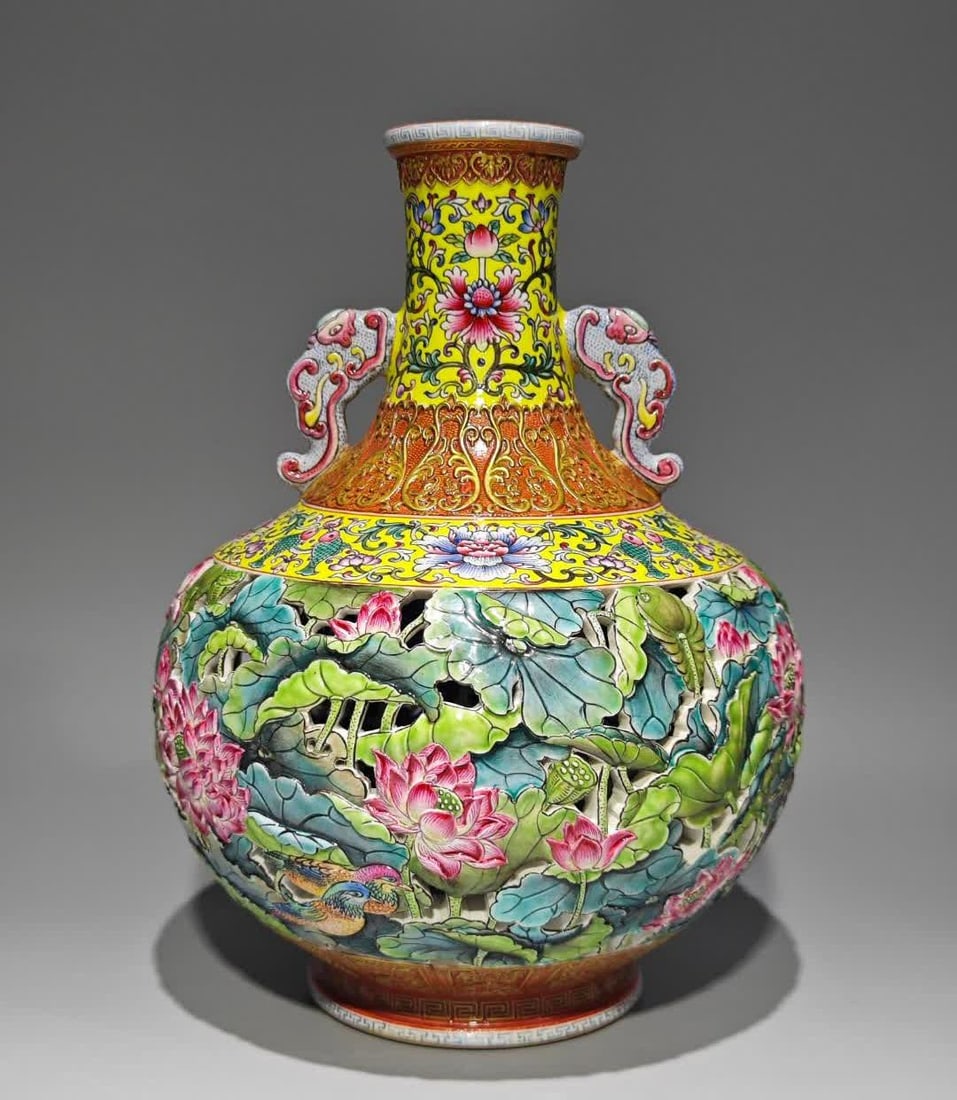 A piece of Qianlong enamel color yellow ground Fu Lu Shou consecrated hollow lotus pond fun amphora: Qianlong year enamel colorful yellow ground Fu Lu Shou consecrated hollow lotus pond fun amphora SIZE: H: 25.3cm Belly D: 19cm (The Dimensions Of All Batches Are Manually Measured.If You Need More Det