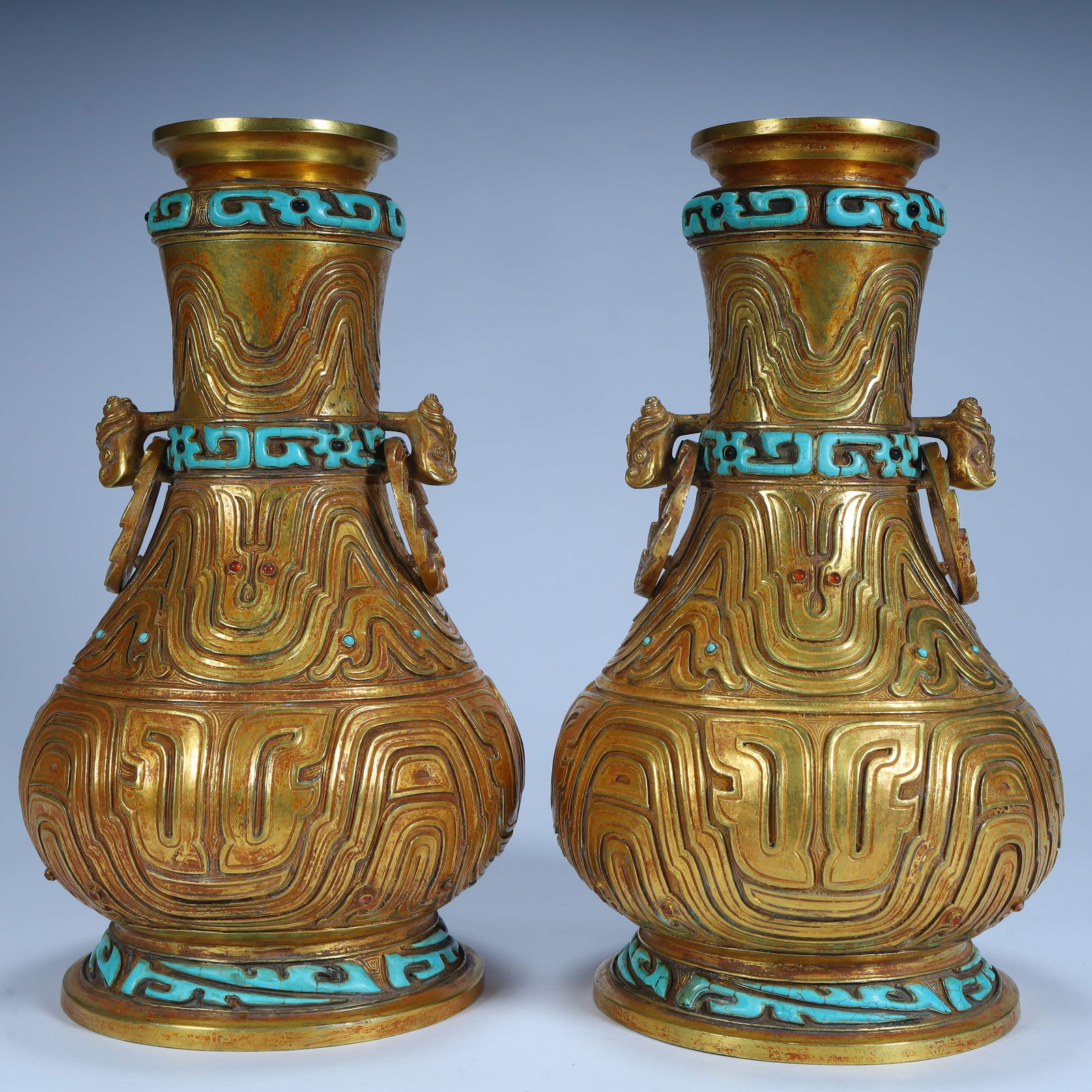 A pair of Qing Dynasty gilded turquoise animal ear living ring bottles (1 of 16)