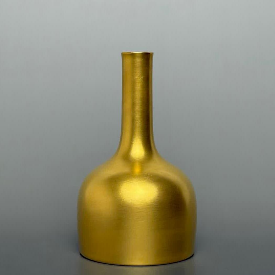 A Qing Dynasty Kangxi Jindi Rattle Statue (1 of 4)