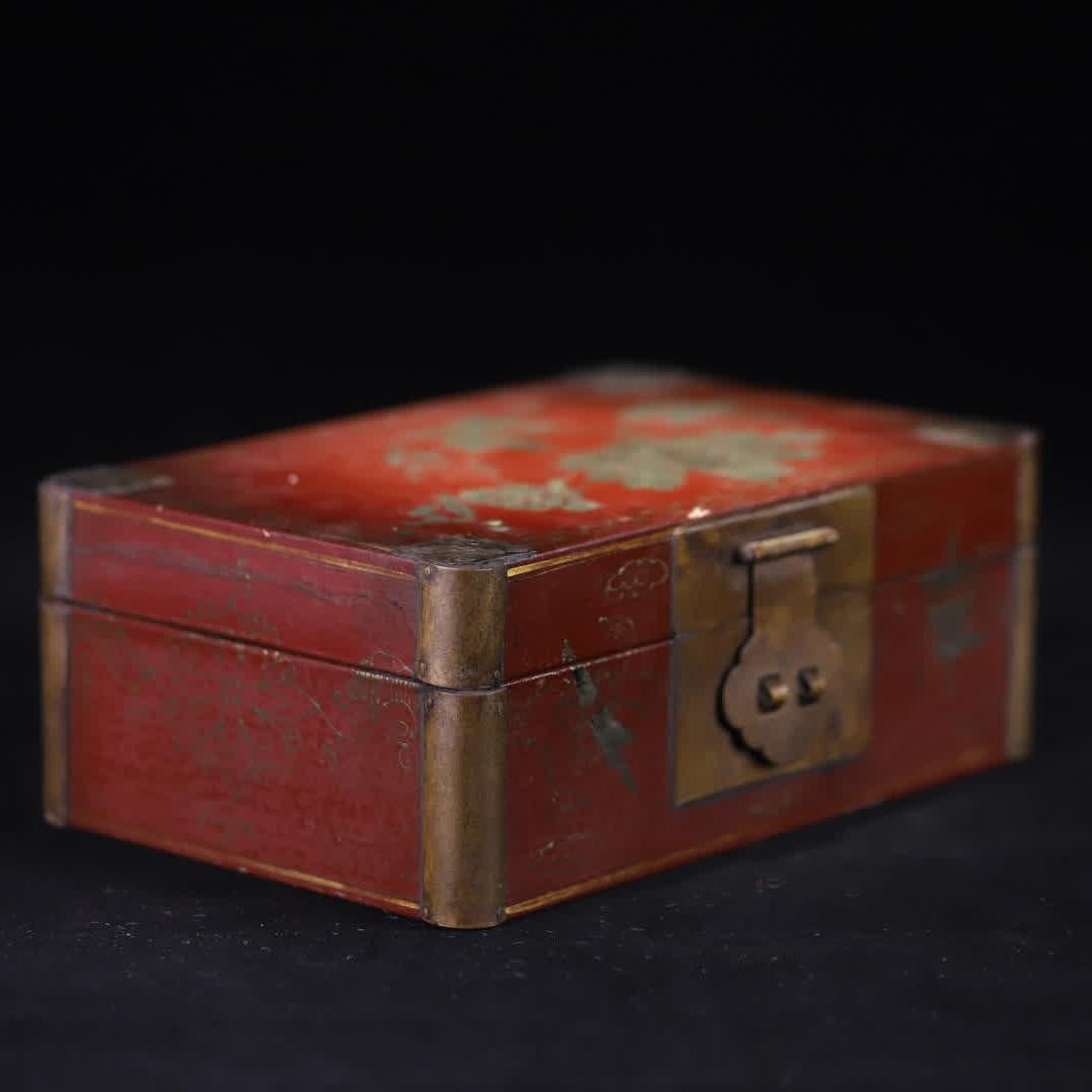 A Qing Dynasty vermilion lacquered gold and silver floral pattern copper decorated study box (1 of 9)