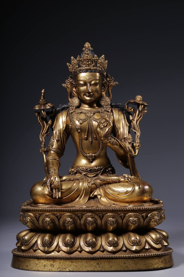 A seated statue of Tara in copper gilt from the Qing Dynasty (1 of 11)