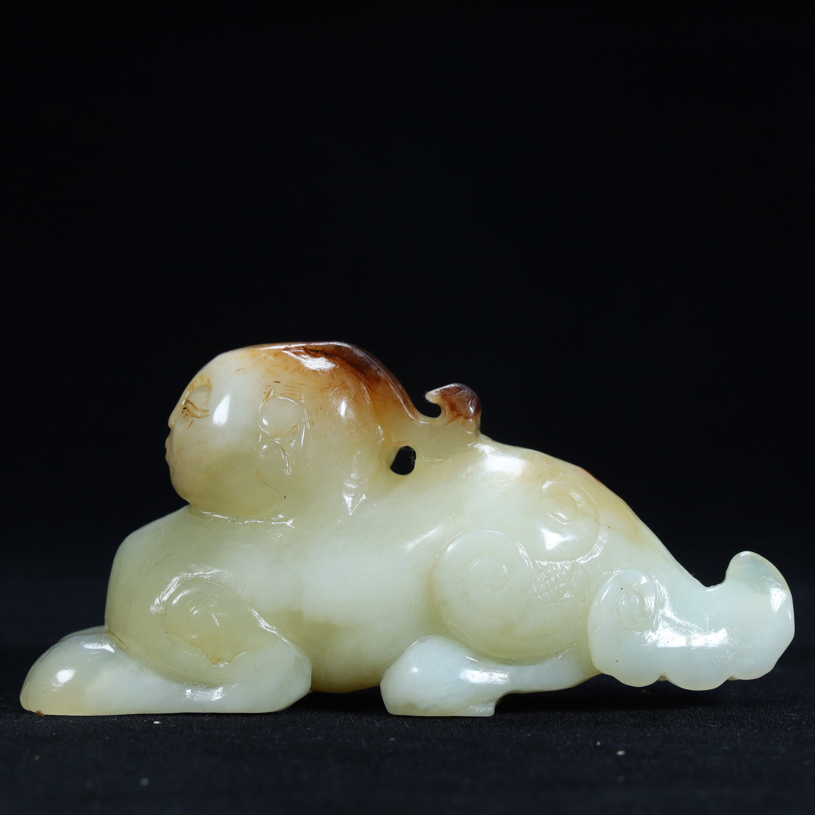 A Qing Dynasty Hetian jade beast ornament (1 of 11)