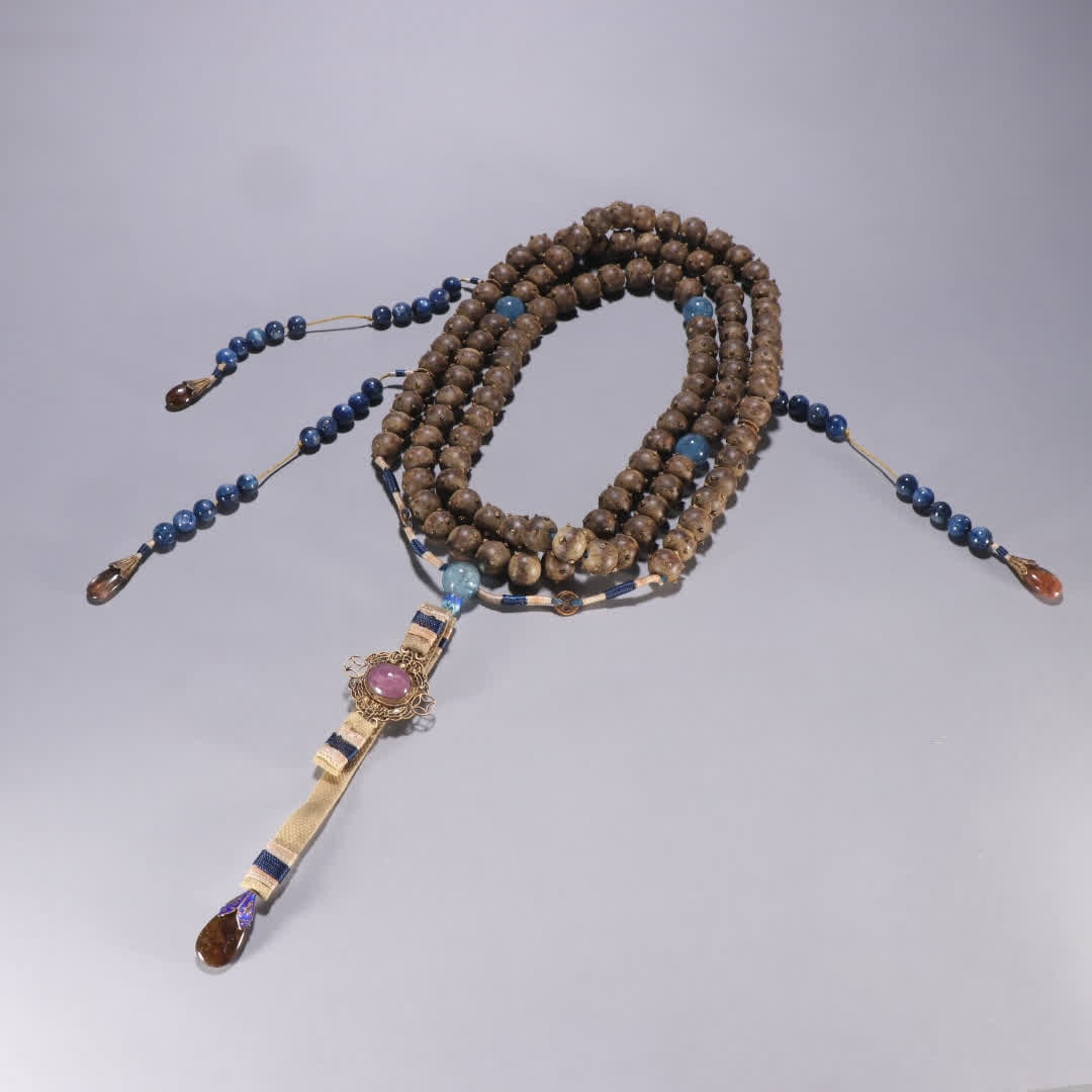 A Qing Dynasty agarwood rosary: Qing Dynasty agarwood rosary SIZE: Bead diameter 1.3cm W: 216.8g (The Dimensions Of All Batches Are Manually Measured.If You Need More Detailed Information, Please Contact Our Customer Service Before