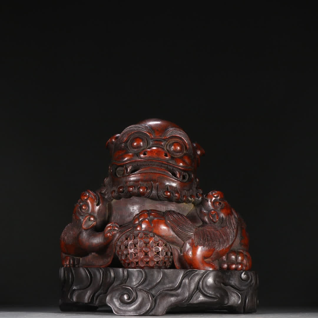 A bamboo carved lion playing ball ornament: Bamboo carved lion ball ornaments SIZE: H:16cm W:14.7cm W:630g (The Dimensions Of All Batches Are Manually Measured.If You Need More Detailed Information, Please Contact Our Customer Service