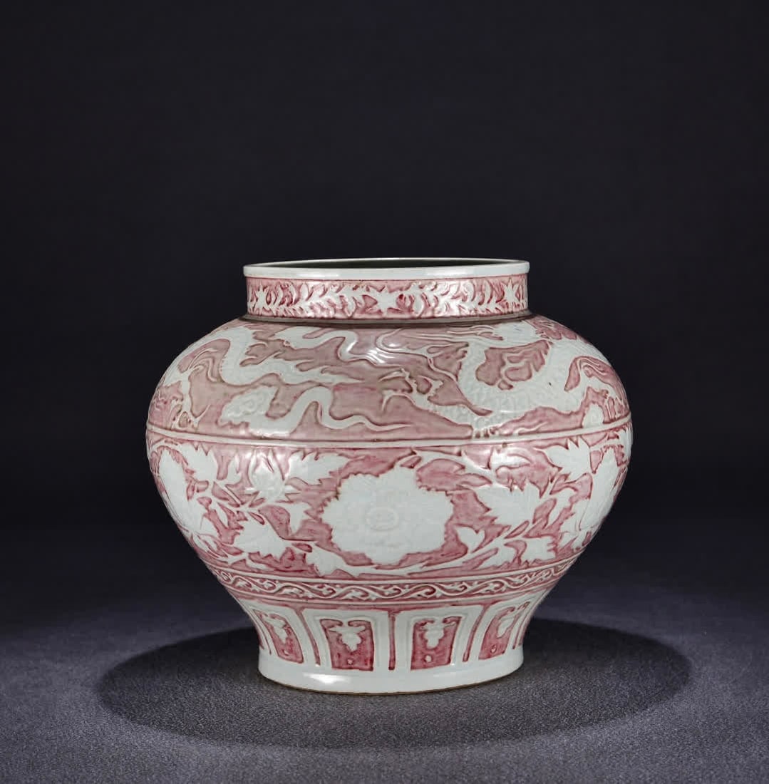 A Yuan Dynasty glazed red and white carved entwined peony jar: Yuan Dynasty glaze red left white carved entwined peony jar SIZE: H:33cm W:34cm (The Dimensions Of All Batches Are Manually Measured.If You Need More Detailed Information, Please Contact Our