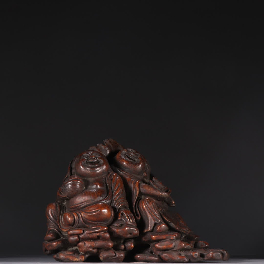 A Qing Dynasty bamboo carving and two immortal statues (1 of 9)