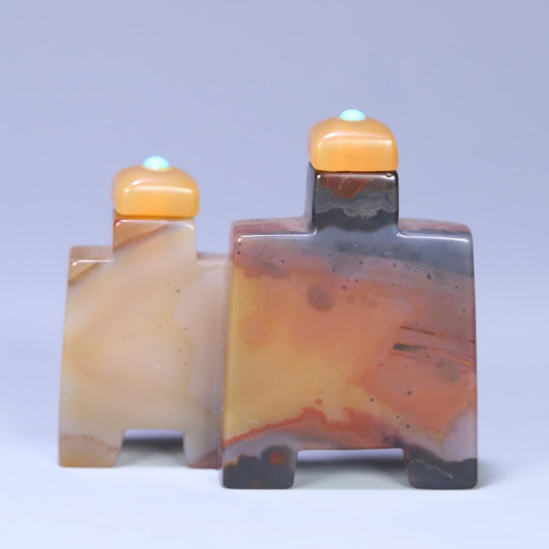 A Qing Dynasty agate ancient coin-shaped double snuff bottle (1 of 9)