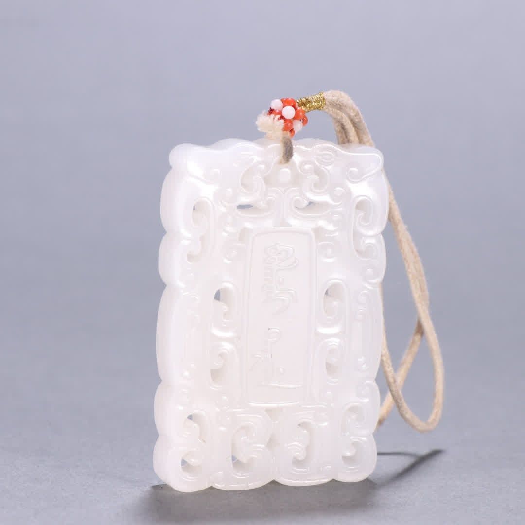 A Qing Dynasty Hetian jade fasting card (1 of 9)