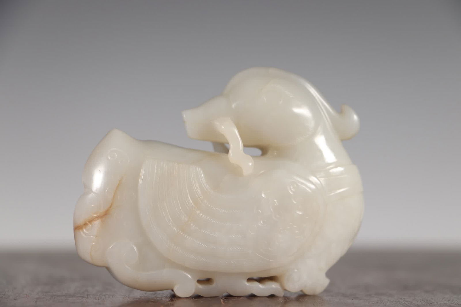 A piece of Qing Dynasty Hetian seed material treasure duck with a branch (1 of 7)