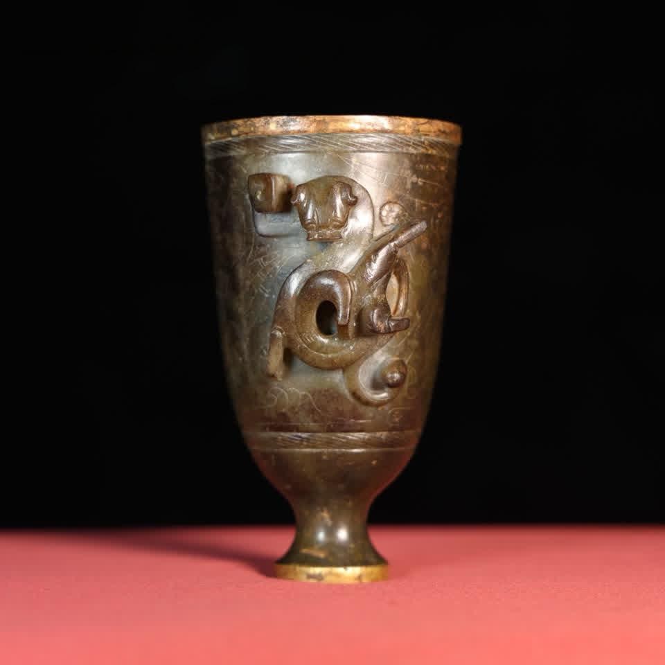 A Han Dynasty dragon gilt inlaid cup (1 of 9)