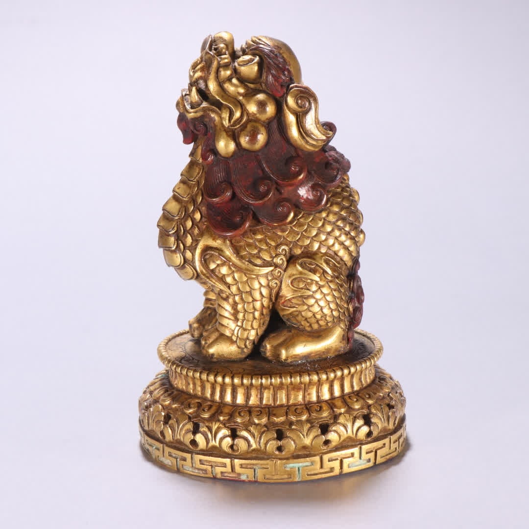 A copper-gilt dragon button seal (1 of 9)