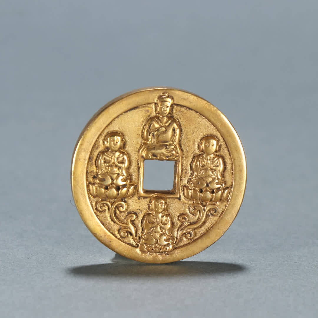 A Song Dynasty copper-gilt Chunhua ingots coin (1 of 9)