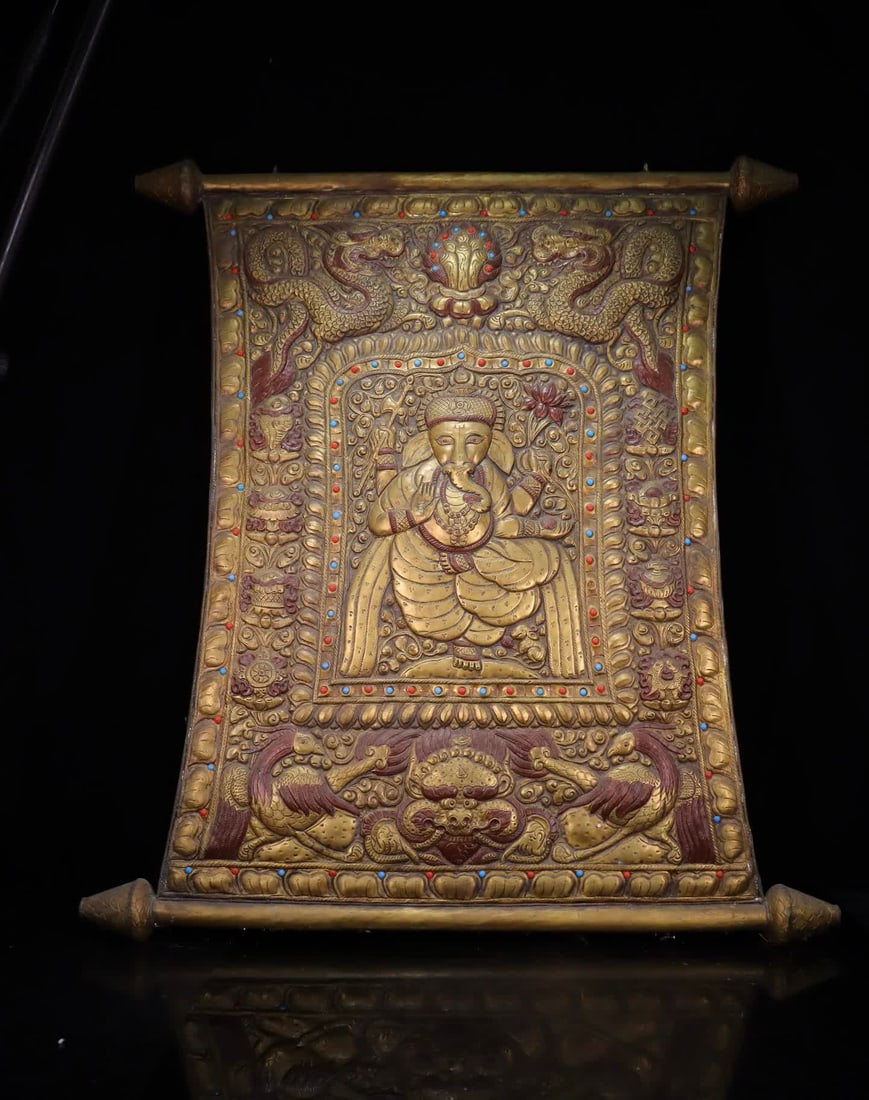 A copper carved thangka of the god of wealth carved with an elephant trunk (1 of 10)