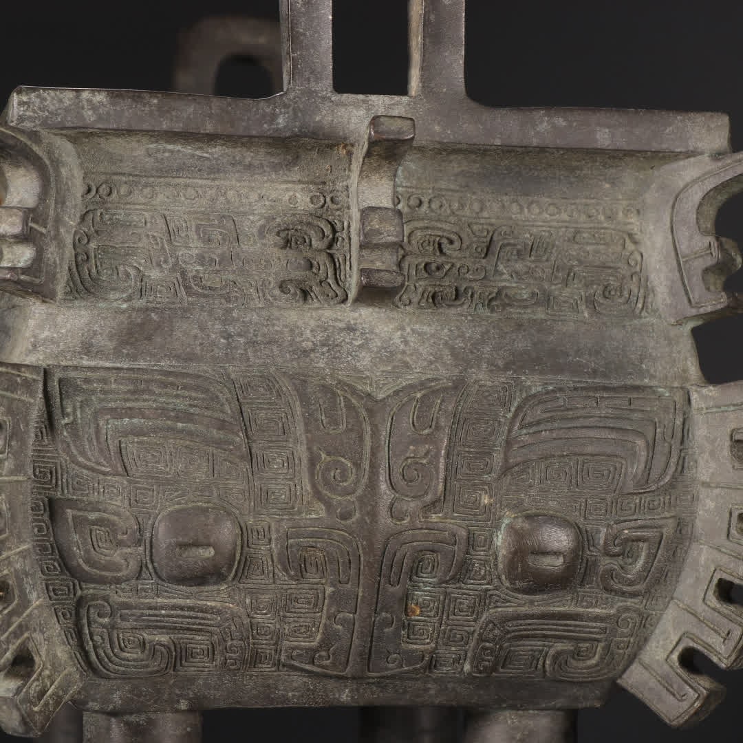 A copper gluttonous pattern square tripod - 4