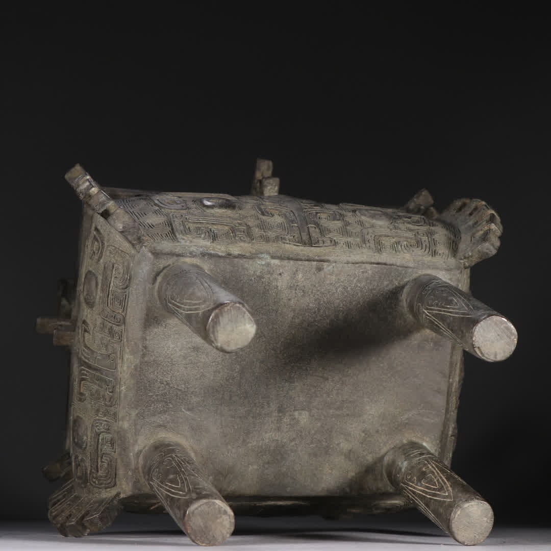 A copper gluttonous pattern square tripod - 9