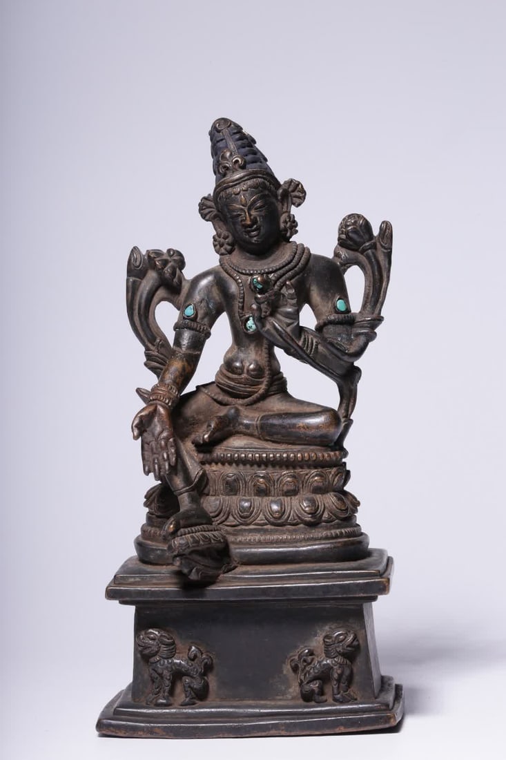 A seated statue of Tara in turquoise green in the Qing Dynasty (1 of 8)