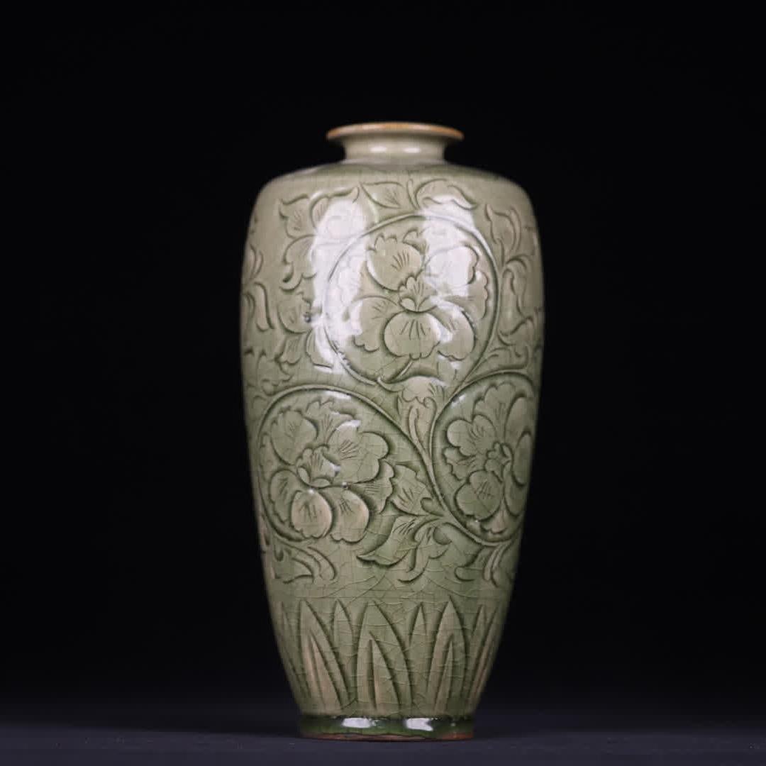 A Song Dynasty Yaozhou kiln celadon carved plum vase (1 of 9)