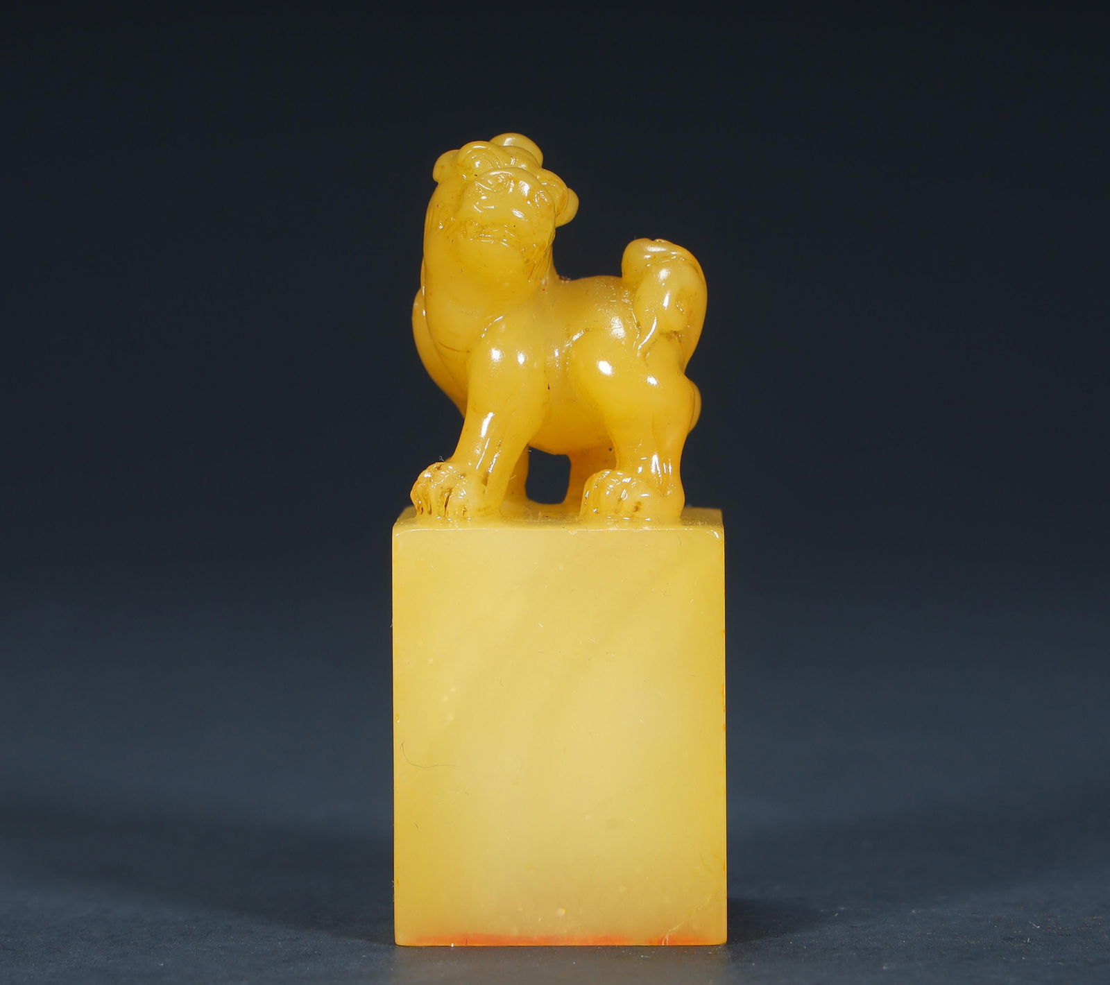 A Qing Dynasty Tian Huangshi "Auspicious Beast Button Seal (1 of 10)