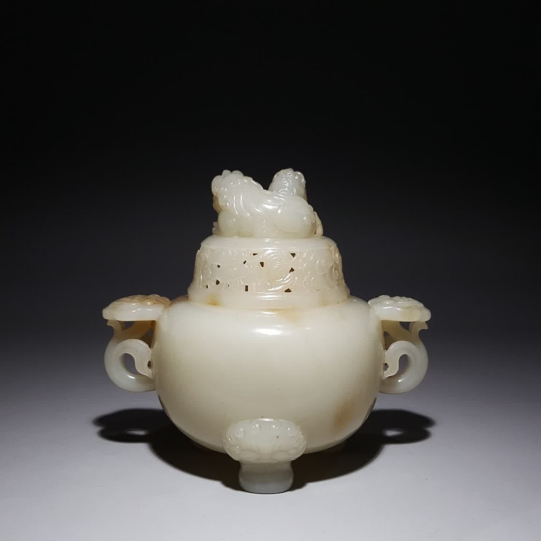 A Qing Dynasty Hetian jade double beast ruyi ear incense burner (1 of 9)