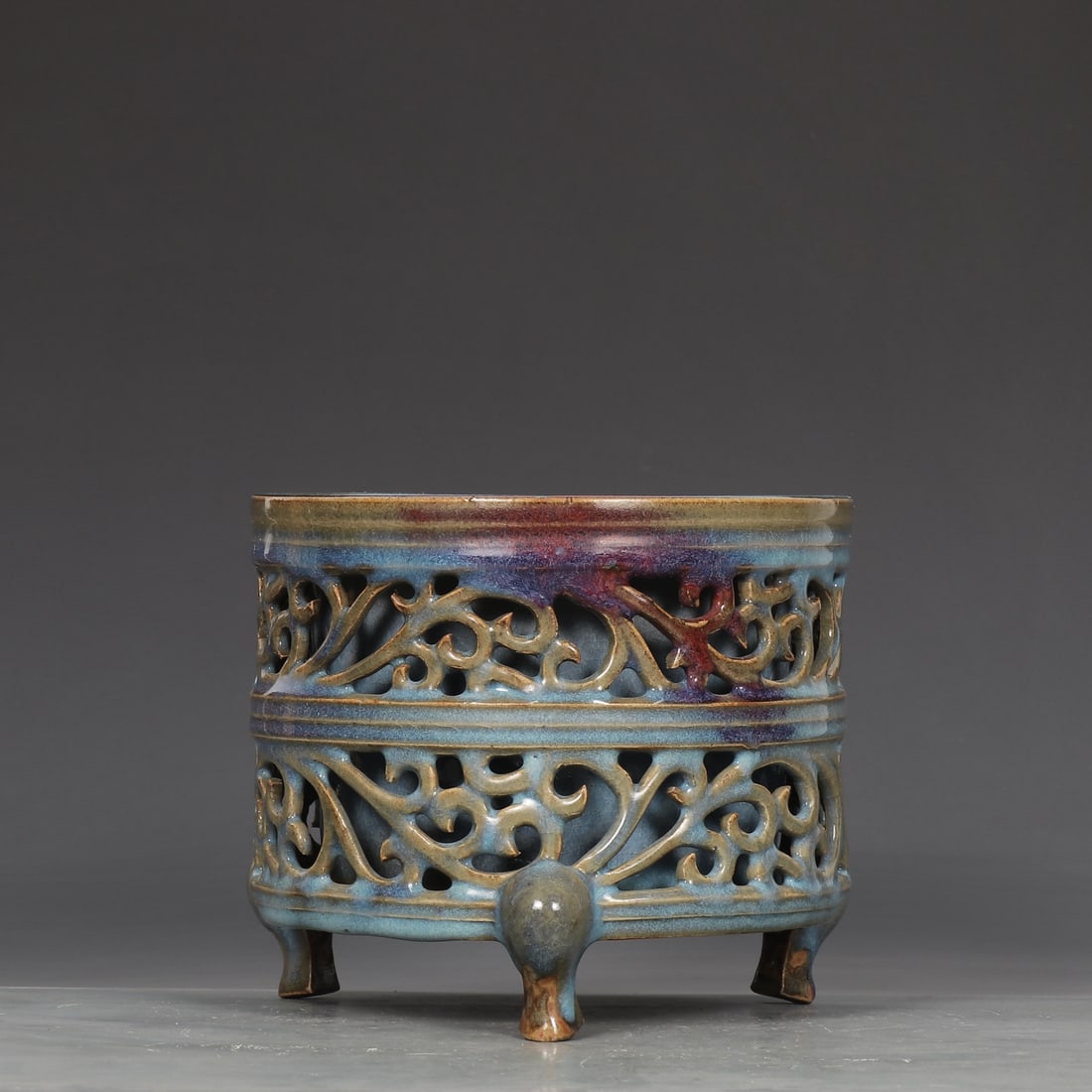 A purple-red spotted imperial hollow string pattern three-legged furnace of the Song Dynasty Jun (1 of 9)