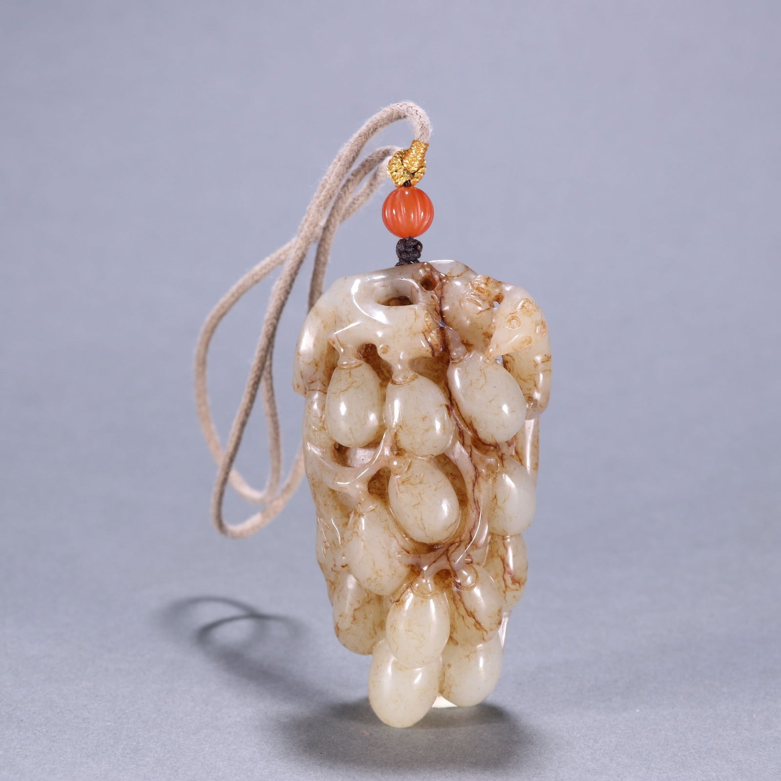 A Qing Dynasty Hetian jade squirrel grape pendant (1 of 9)