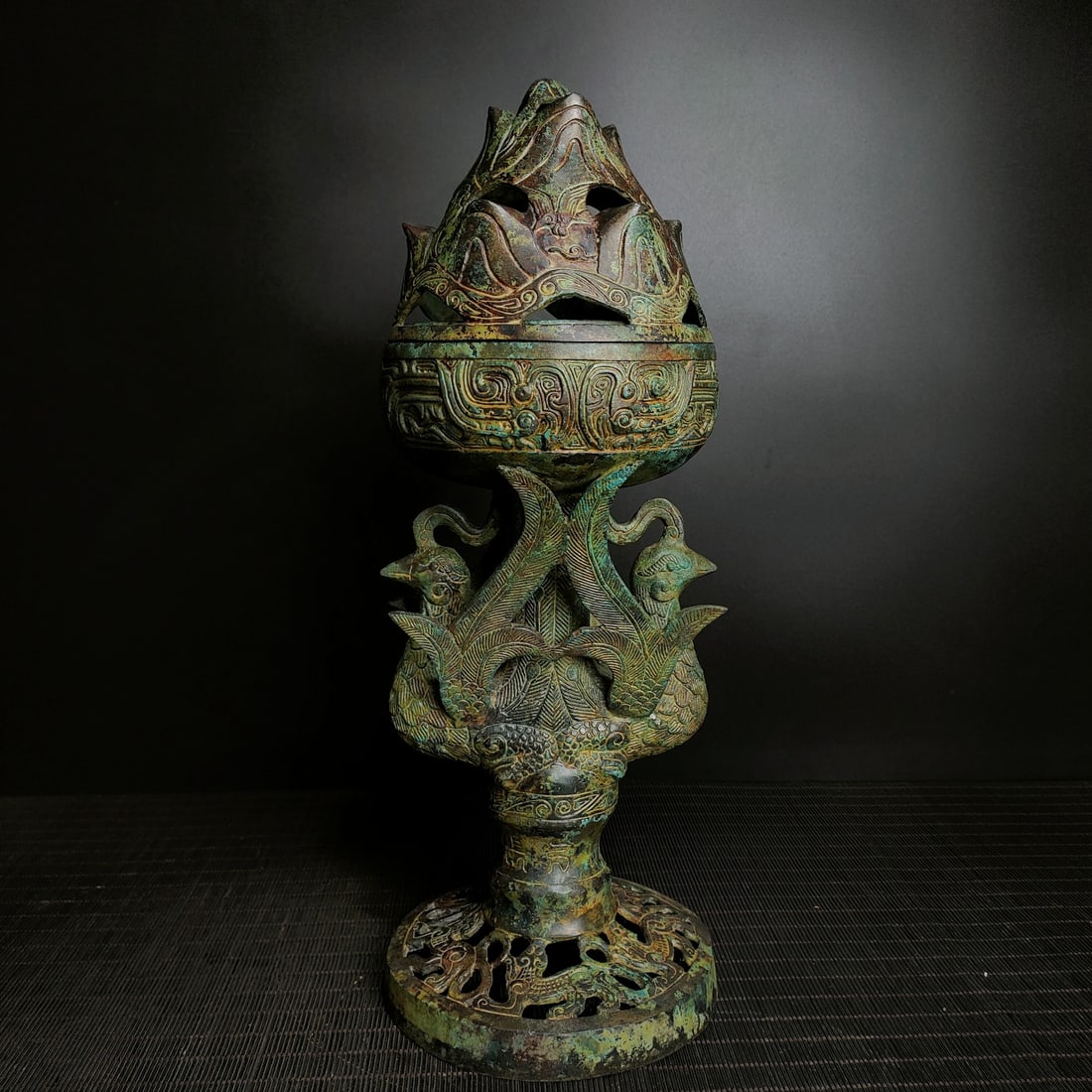 A bronze phoenix smoke from the Warring States period (1 of 9)