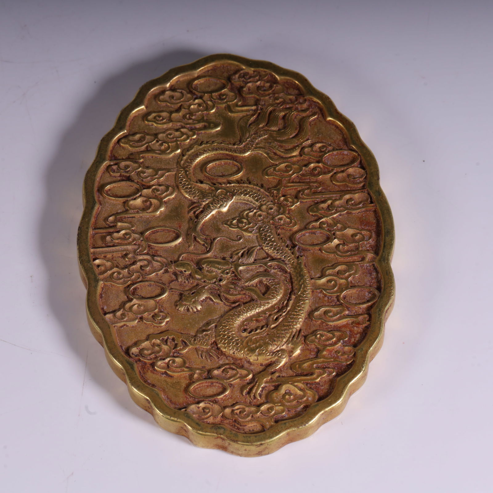 A gilded dragon pattern plaque of the Qing Dynasty (1 of 4)