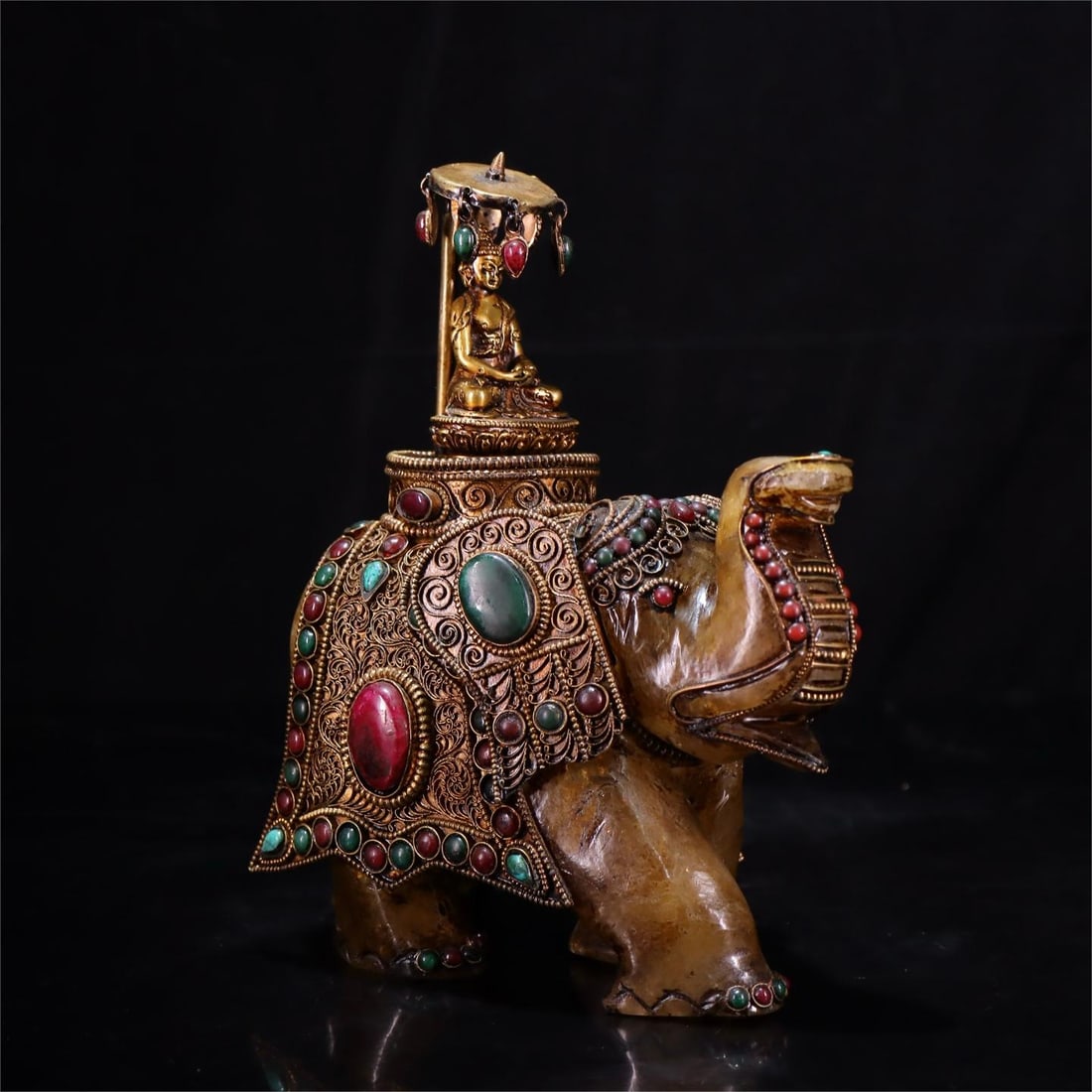 A beautiful statue of the Buddha carrying a treasure elephant (1 of 8)