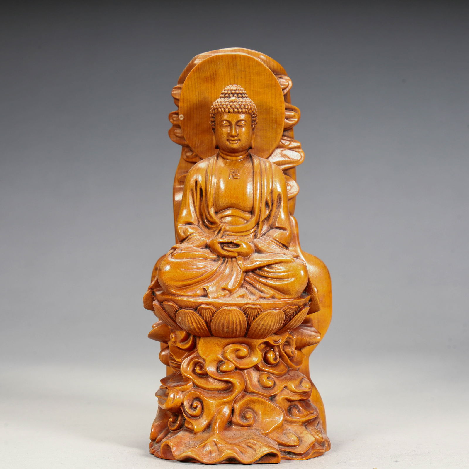 A seated statue of Shakyamuni Buddha in boxwood from the Qing Dynasty (1 of 9)