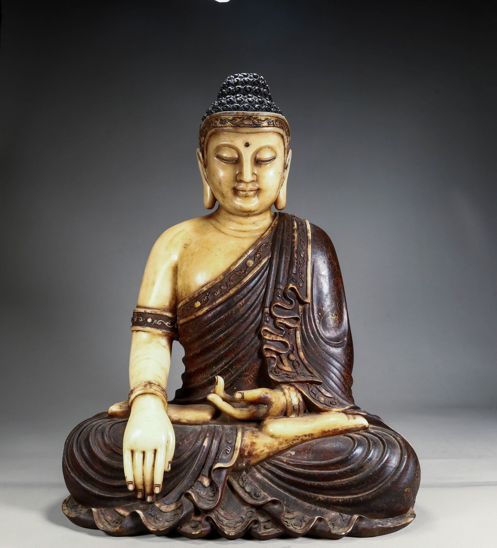 A white jade Shakyamuni Buddha from the Qing Dynasty (1 of 12)