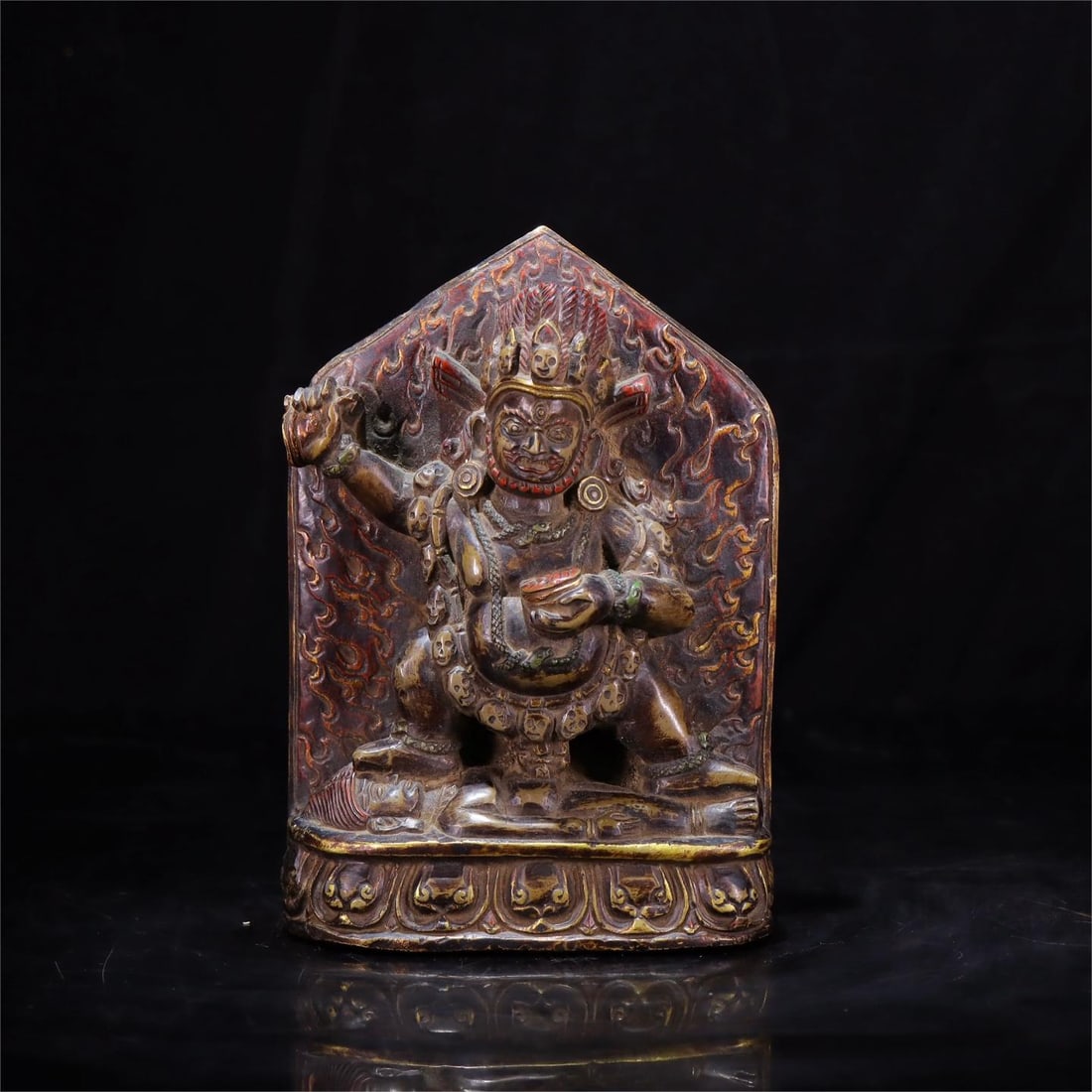 A fine black stone painted carved Mahakala (1 of 10)