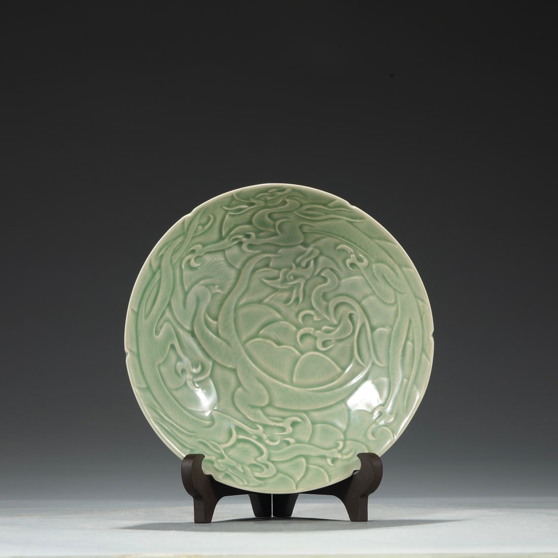 A secret color celadon carved seawater dragon pattern plate from the Yue kiln in the Tang Dynasty (1 of 7)