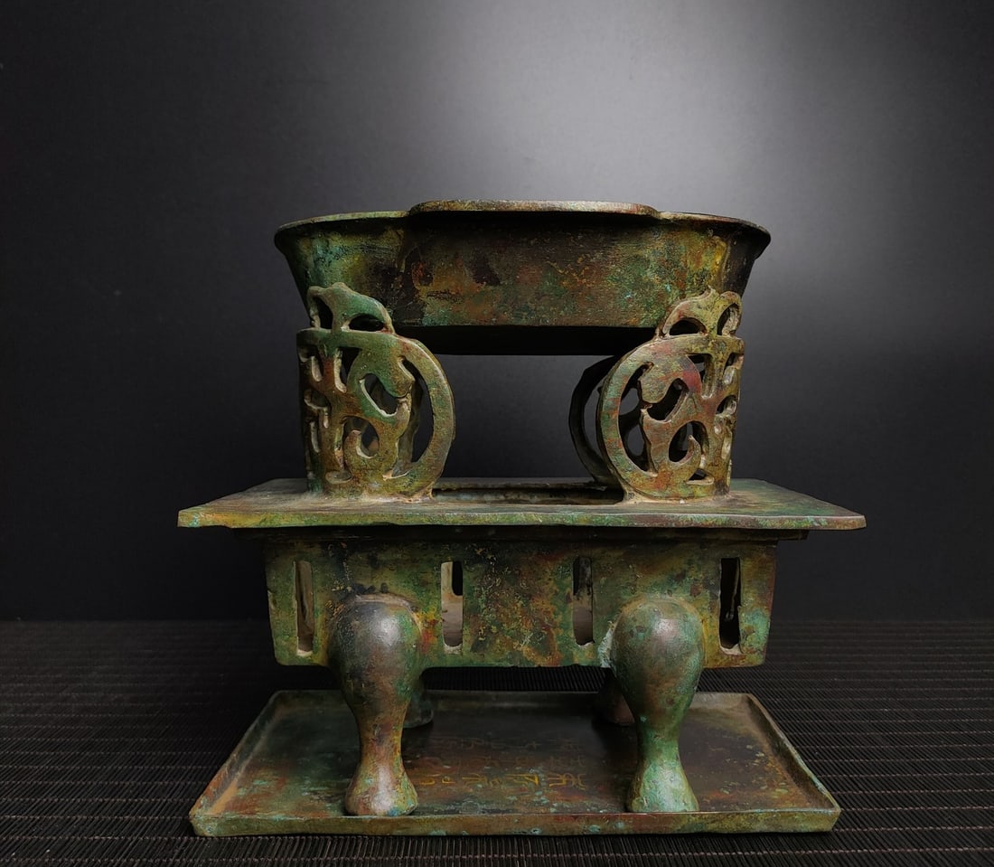 A bronze wine table from the Warring Han Dynasty (1 of 9)