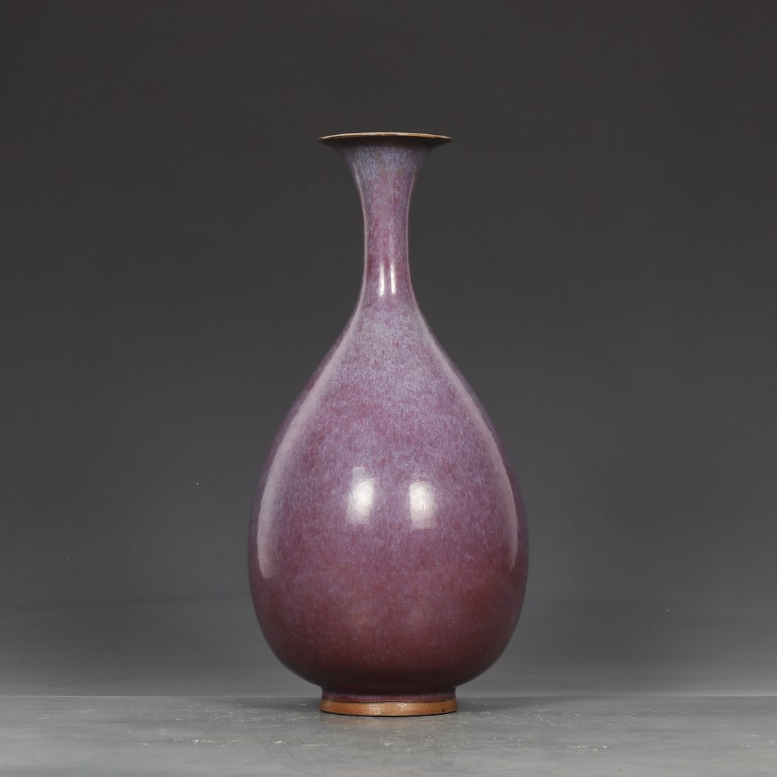 A rose purple glaze jade pot spring from the Song Dynasty Jun kiln: Song Dynasty Jun kiln rose purple glaze jade pot spring Size:H:28.5cm Calibre:6.5cm Belly diameter:14cm (The Dimensions Of All Batches Are Manually Measured.If You Need More Detailed Information, Plea