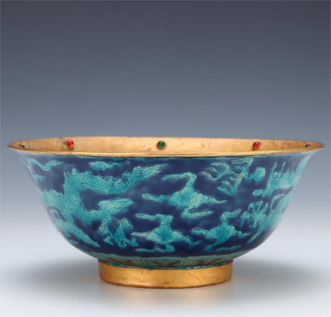 A peacock blue glaze-covered gold carved cloud dragon pattern bowl made in the Xuande period of the (1 of 9)