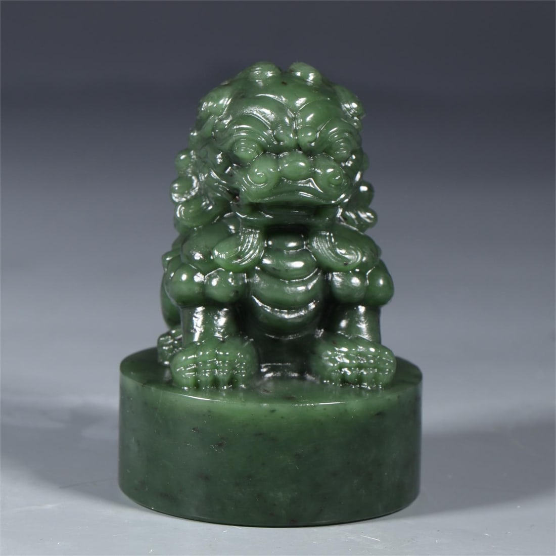 A Hetian jasper lion paperweight from the Qing Dynasty (1 of 3)