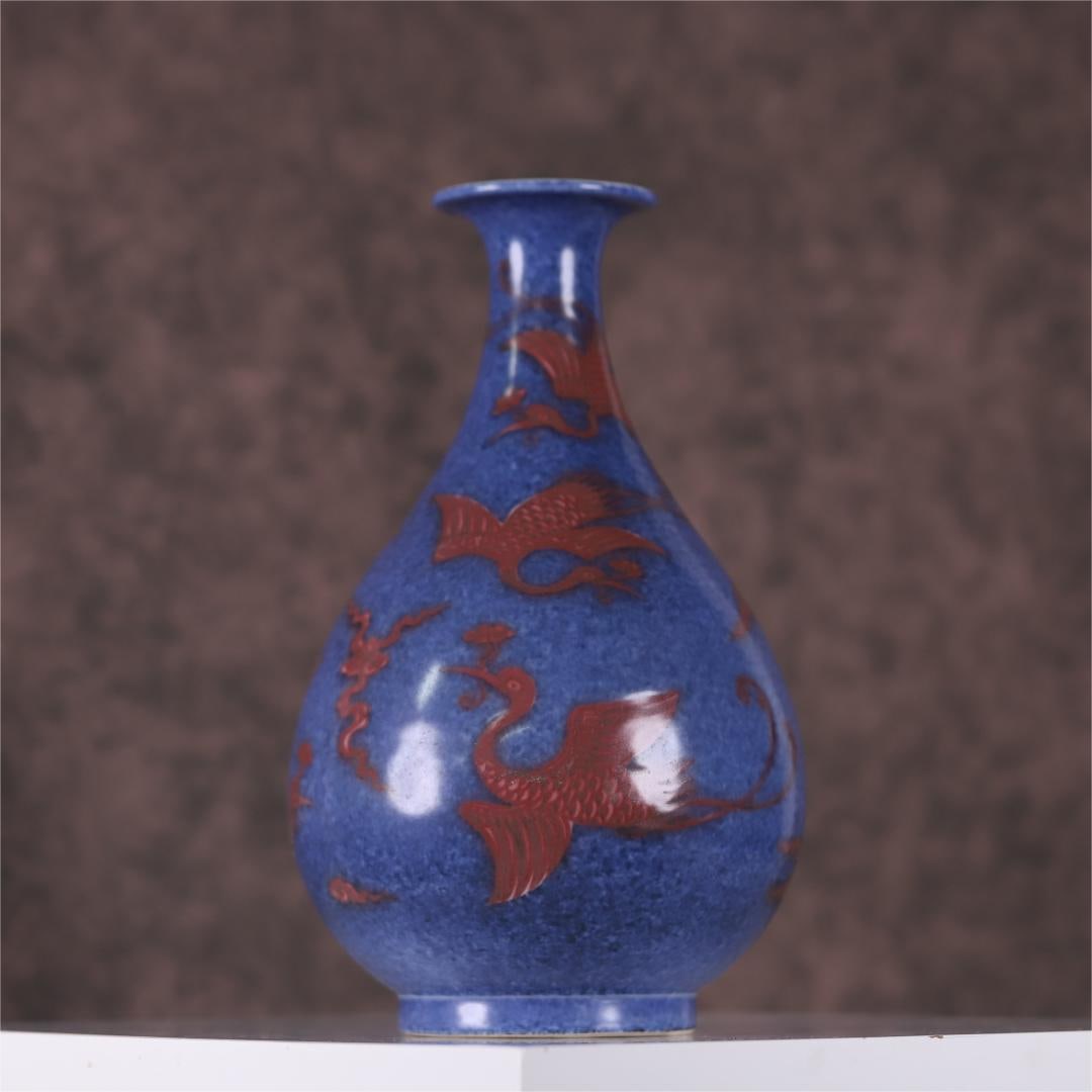 A spring vase made in the Xuande year of the Ming Dynasty with blue glaze glazed red crane pattern (1 of 9)
