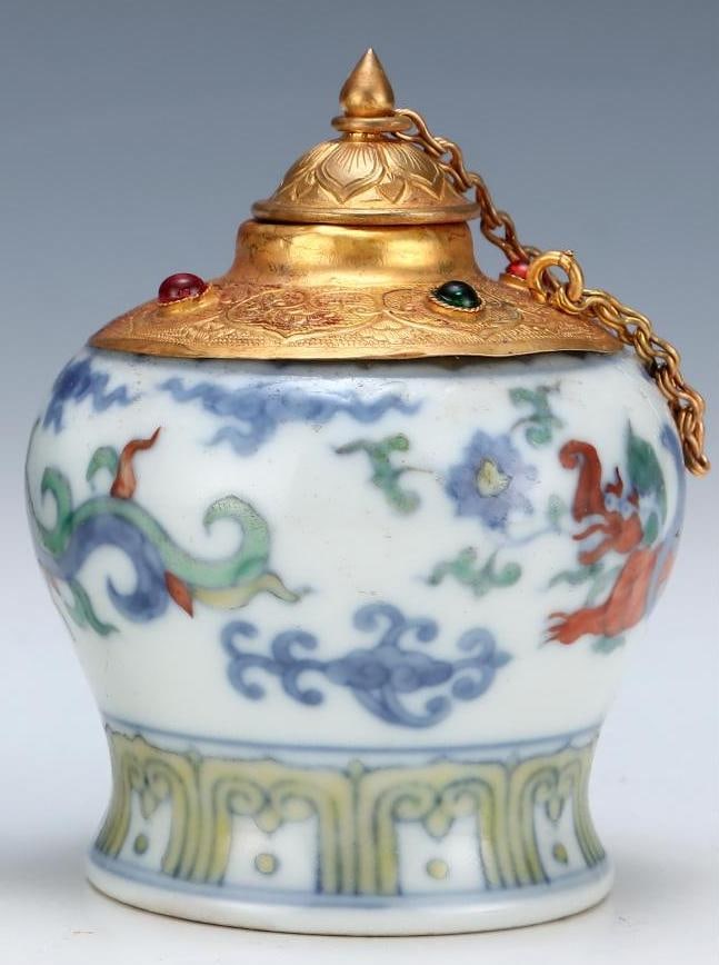 A Ming Dynasty Chenghua year Doucai wrapped gold carved Kui dragon pattern heavenly character jar (1 of 4)