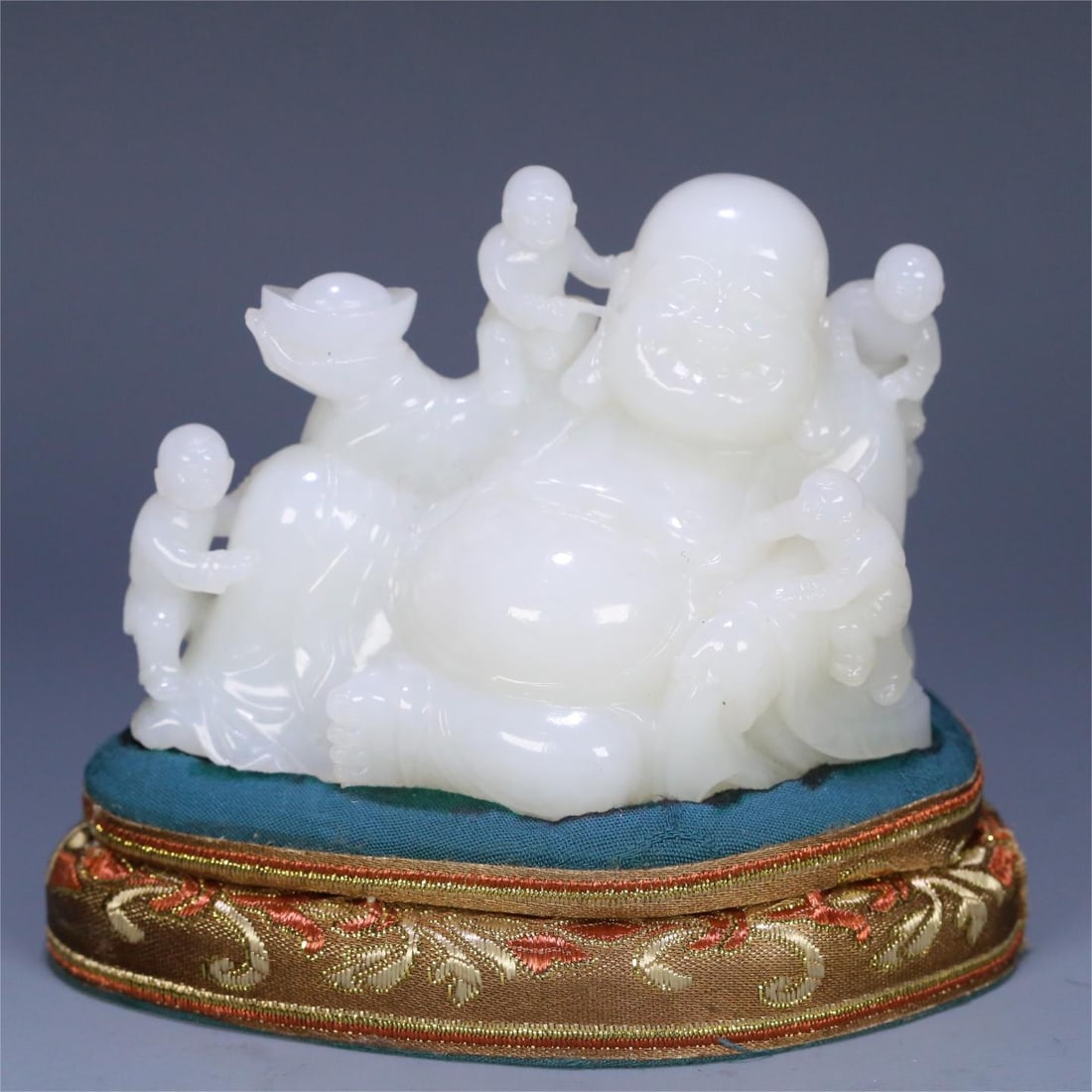 A Qing Dynasty Hetian white jade five sons of the Denke ornament: Qing Dynasty's Hetian white jade five sons Denke ornaments Size:8.8x4.2x6.4cm W:262.6g (The Dimensions Of All Batches Are Manually Measured.If You Need More Detailed Information,