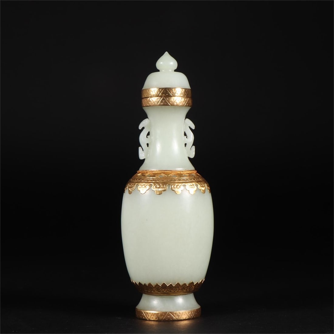 A Qing Dynasty Hetian jade-clad gold-capped bottle (1 of 9)