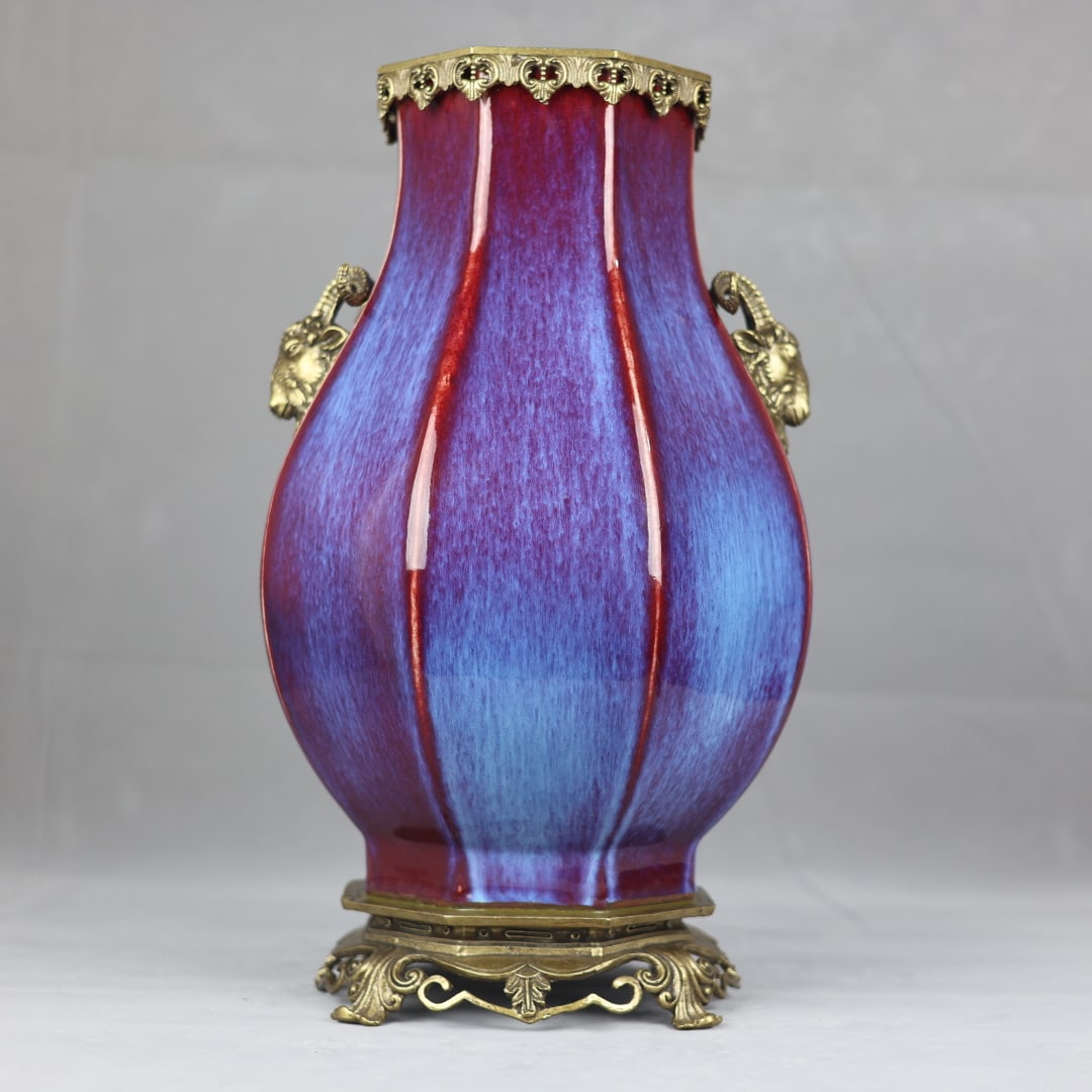 A beautiful copper-inlaid porcelain kiln Bianlang kiln red glaze inlaid with copper elephant ear: Exquisite copper-inlaid porcelain kiln Bianlang kiln red glaze inlaid with copper elephant ear melon edge Size:H:44cm Calibre:16cm D:24cm Bottom:20cm (The Dimensions Of All Batches Are Manually Measur