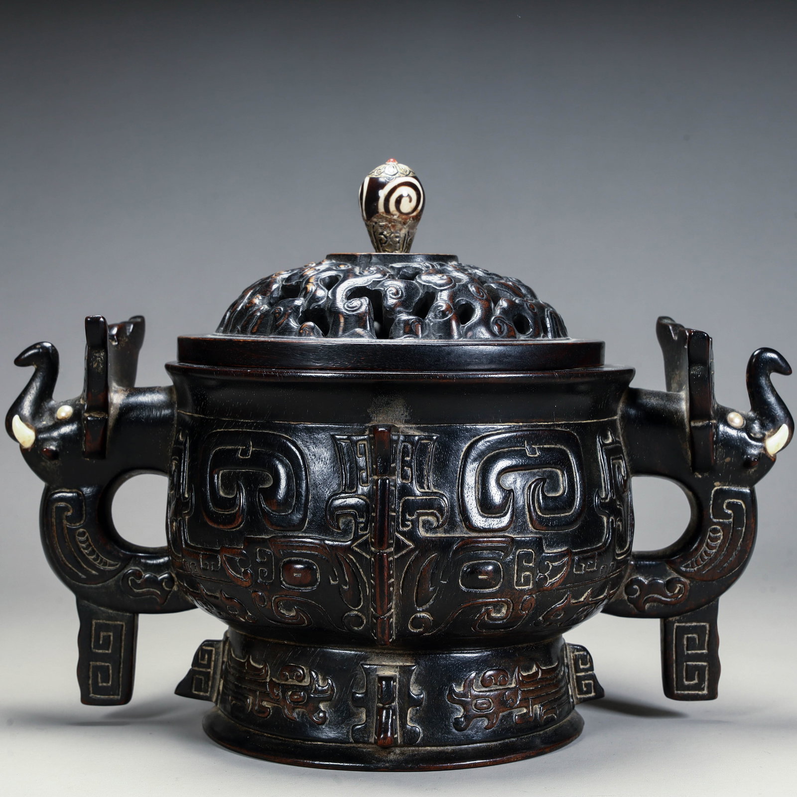 A Qing Dynasty rosewood inlaid treasure imitation bronze animal face pattern elephant ear aroma (1 of 10)