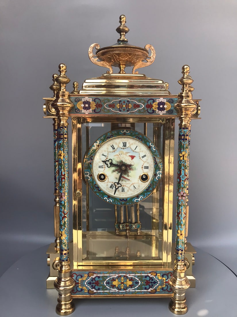 A fine enamel vintage mechanical pendulum clock (1 of 9)