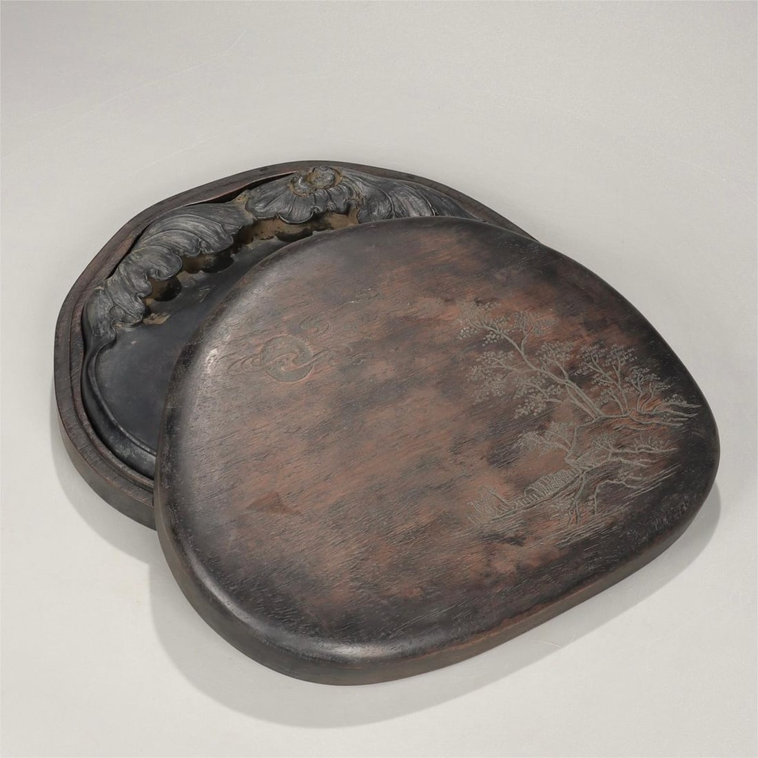 A Qing Dynasty Ding Jintang style Qing lotus pattern inkstone (1 of 9)