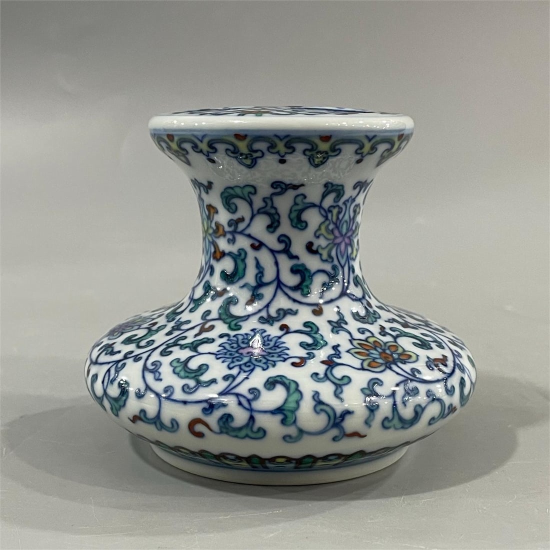 A Doucai entwined lotus pattern incense insert made in the Yongzheng year of the Qing Dynasty (1 of 6)