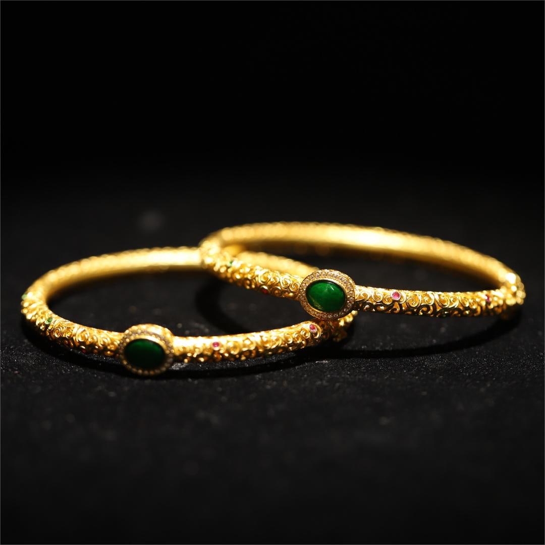 A pair of exquisite silver-gilt jadeite bracelets (1 of 11)