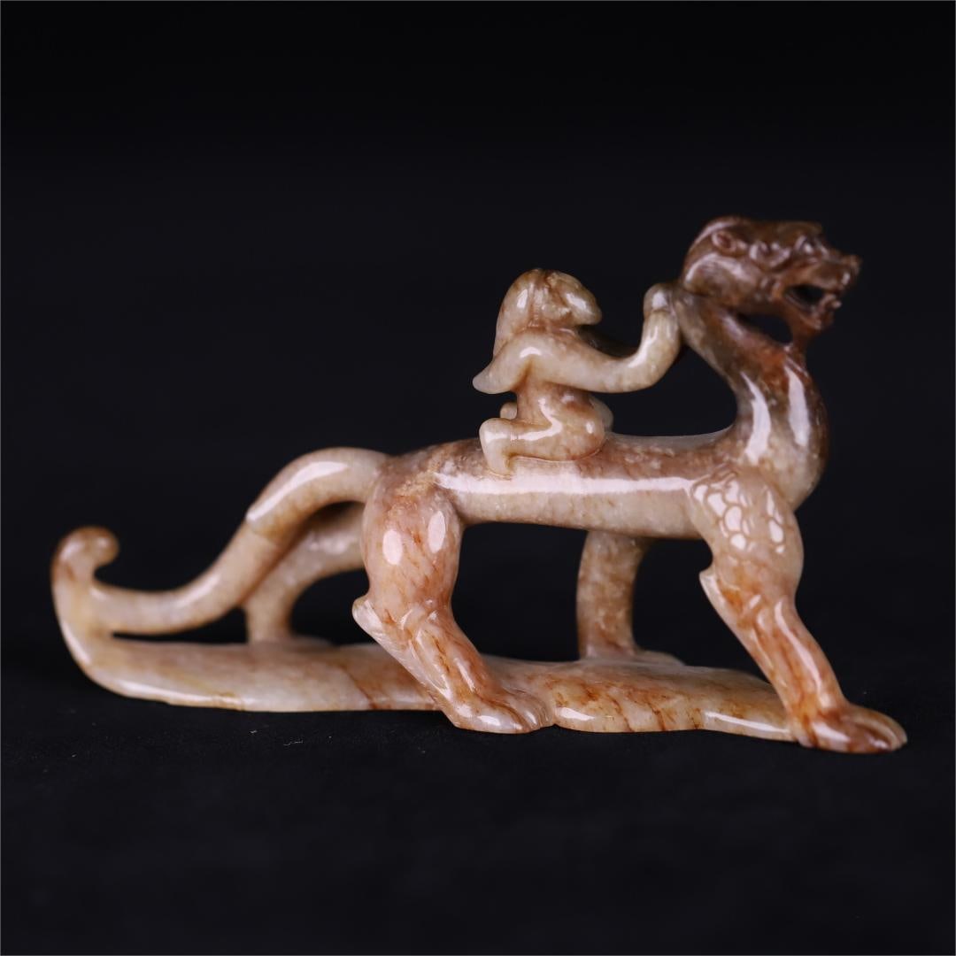 An ancient jade carving immortal riding auspicious beast ornament of the Han Dynasty (1 of 9)