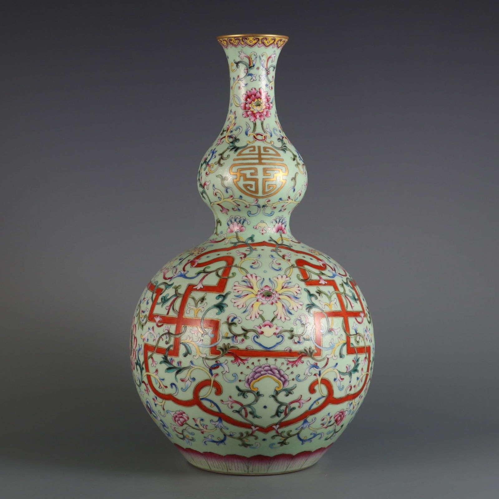 An Exquisite Enamel Green Ground Lotus Pattern Gourd-Shaped Vase (1 of 9)