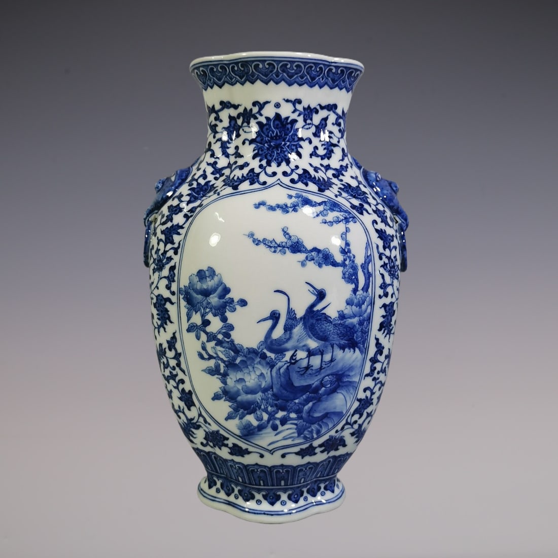 An Exquisite Blue and White Lotus Pattern Flower and Bird Pattern Double-Ears Vase: An Exquisite Blue and White Lotus Pattern Flower and Bird Pattern Double-Ears Vase Qing Dynasty, China Qianlong Six-character Mark Size:31cmx18.8cm (The Dimensions Of All Batches Are Manually Measured