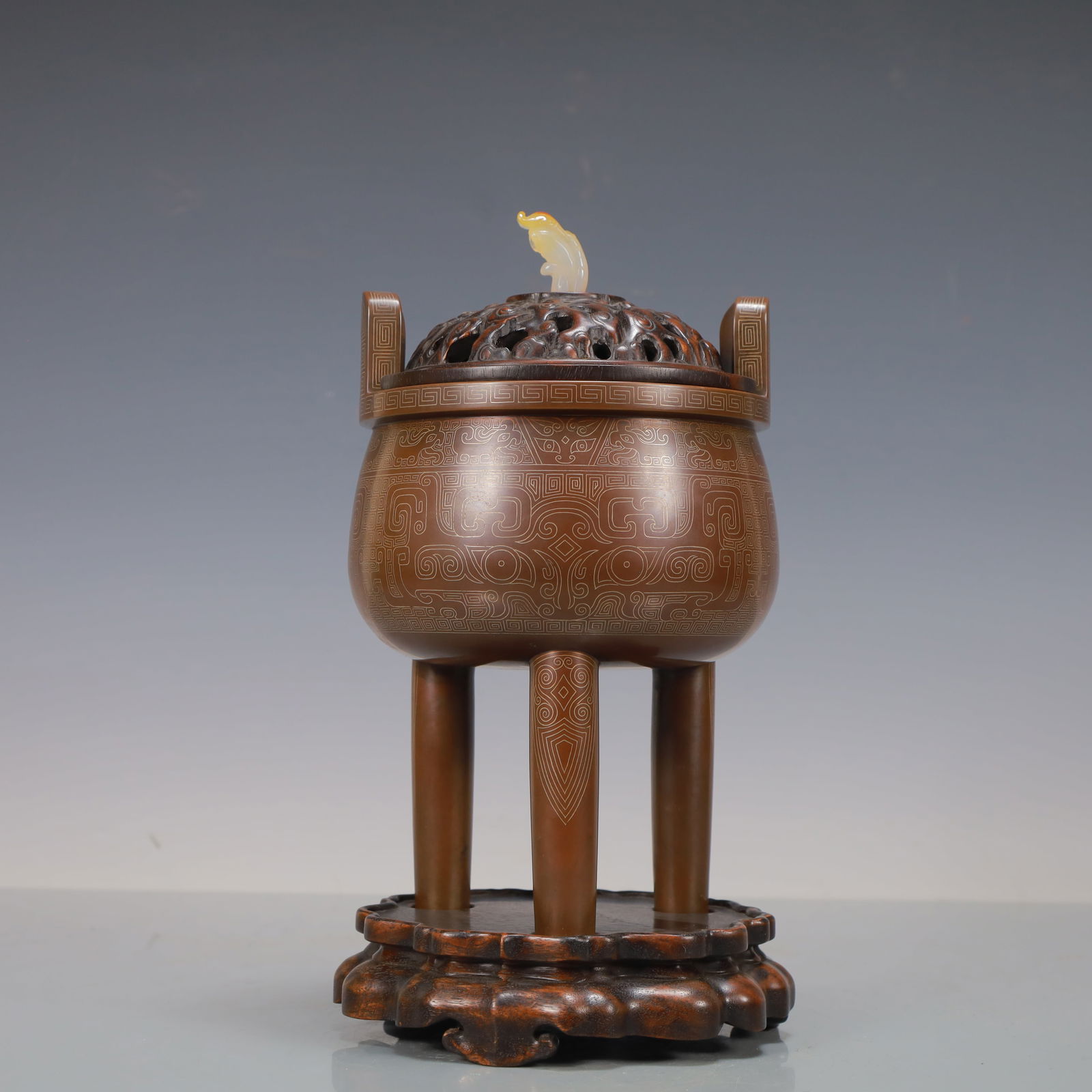 A Exquisite Coppery Inlaid White Jade Beast-Face Pattern Double-Ears and Tripod Censer (1 of 12)